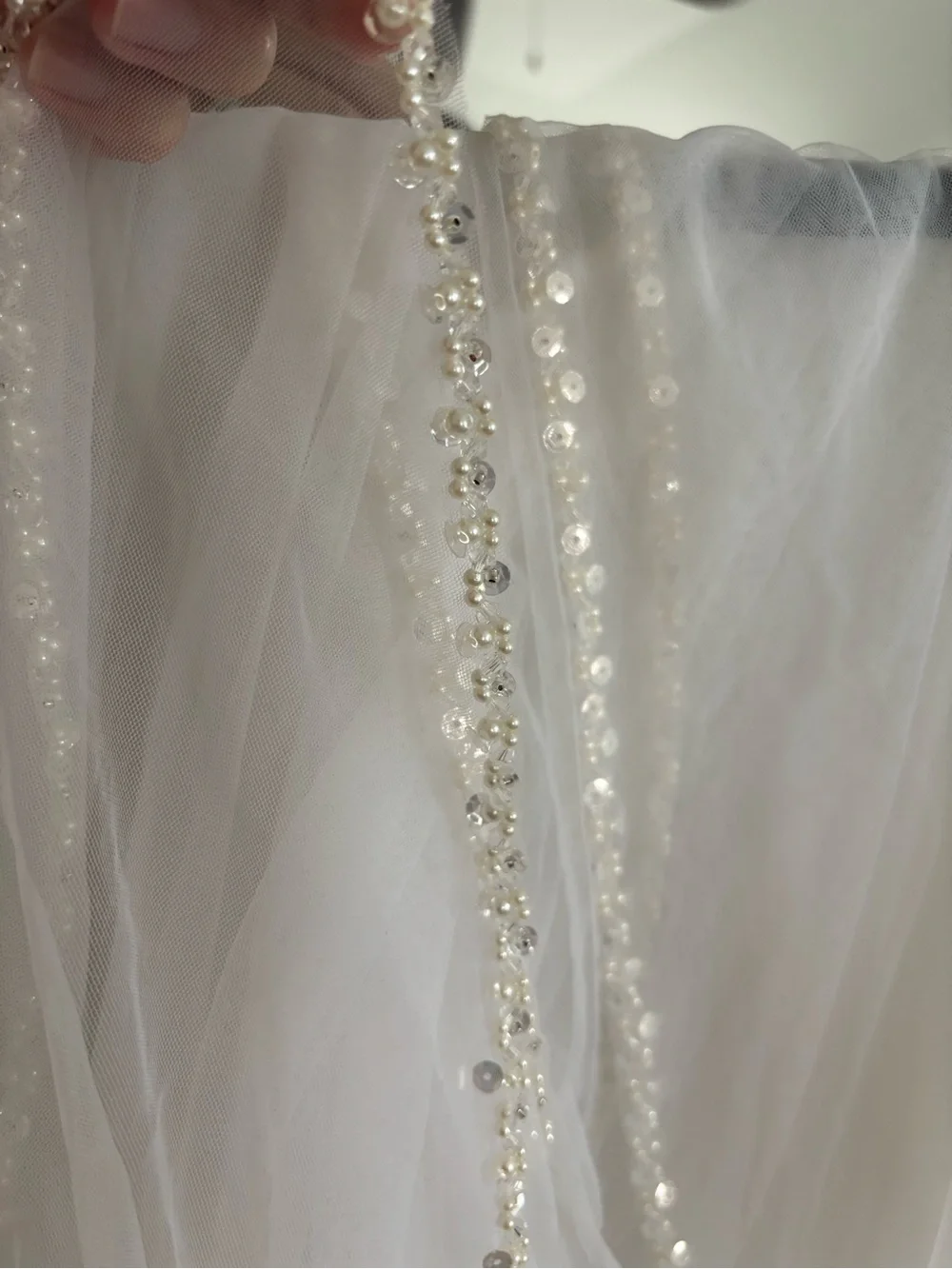 Pearl beaded wedding veil with blusher